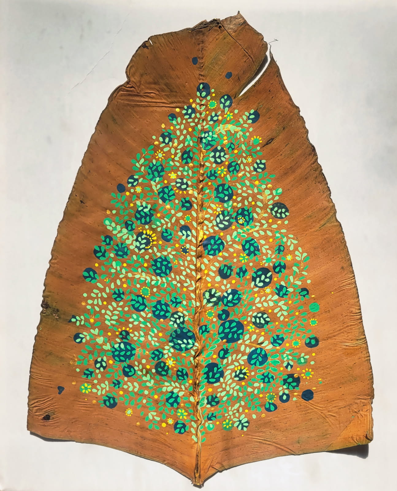 Leaf painted with leaf, autumnal patterns